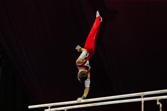 gymnast exercise on parallel bars competition artistic gymnastics, summer sports games