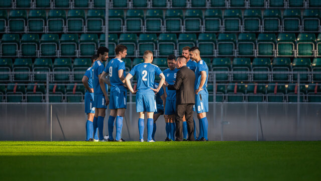 Professional Soccer Team Training, Tactical Coaching: Football Coach Explains Game Strategy, Tactics, Workout Plan to Players. Trainer Motivates Athletes, Leads to Victory, Preparing For Tournament - Powered by Adobe