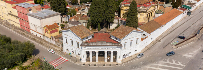 Aerial view of the entrance of the municipal cemetery of Caserta, in Campania, Italy. There are many small chapels and tombs.