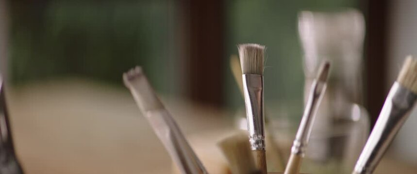 close up of a bunch of paint brushes