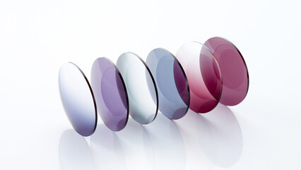 Lenses of glasses, sunglasses lenses of various colors, glass optical lenses taken separately,...