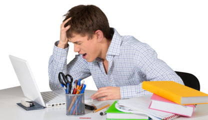 Totally stressed teen male student doing homework