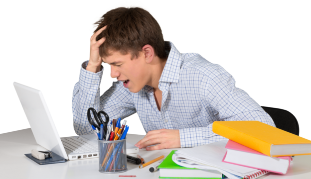 Totally stressed teen male student doing homework