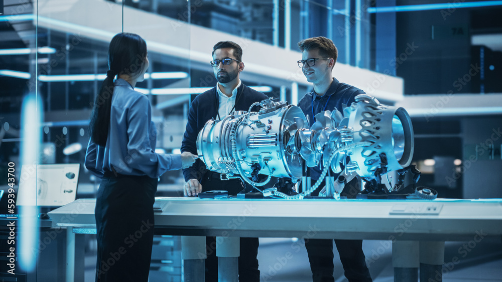 Poster Smart Team of Engineers, Project Manager and Machinery Operators Collaborate on a New Type of a Electric Turbine Engine, Standing with Tablet and Laptop Computers in Scientific Technology Lab.