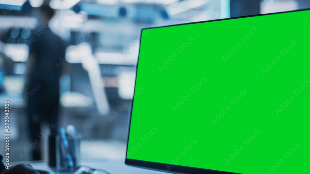 Leinwandbilder Close Up of a Desktop Computer Monitor with Green Screen Mock Up Display Standing in Scientific Research Laboratory Facility.