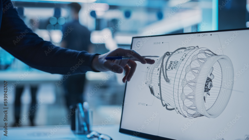 Aufkleber Close Up of a Desktop Computer Monitor Screen with 3D CAD Software with Prototype Jet Engine Project. Specialist Discussing Work, His Hand Visible In Front of the Screen.