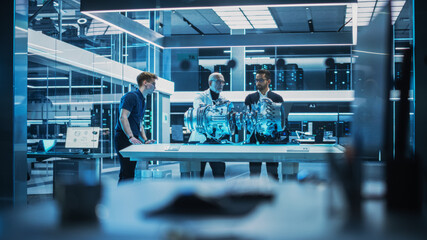 Middle Aged Engineer, Project Manager and Team of Scientists Collaborate on a New Type of a...