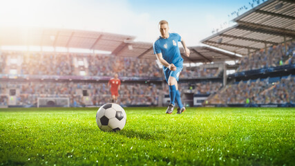 Football World Championship: Soccer Player Runs to Kick the Ball. Ball on the Grass Field of Arena, Full Stadium Crowd Cheers. International Tournament. Cinematic Shot Captures Victory.