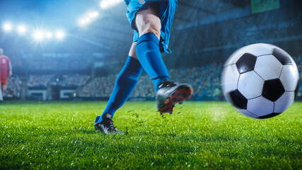 Football World Championship: Soccer Player Runs, Kicks the Ball. Ball Shoots, Grass Sprays Outwards, Full Stadium Crowd Cheers. Cinematic Shot Captures Victory. International Tournament. © Gorodenkoff