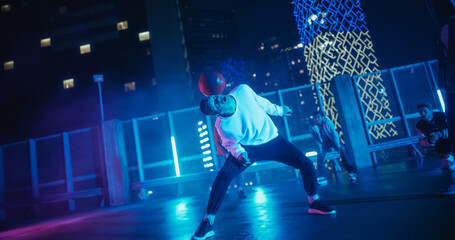 Action Shot with Soccer Athlete Performing Freestyle Tricks with a Ball. Footballer Showing Off Juggling Skills. Urban City Spot with Neon Lights, Graffiti on Walls and Scenery with Skyscrapers