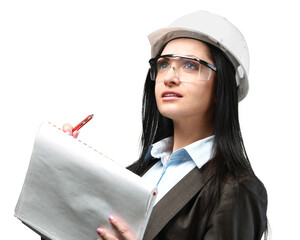 Portrait of beautiful young businesswoman in helmet holding notebook and pen on a white background