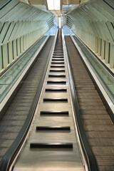 Deserted double way escalator tunnel perspective view