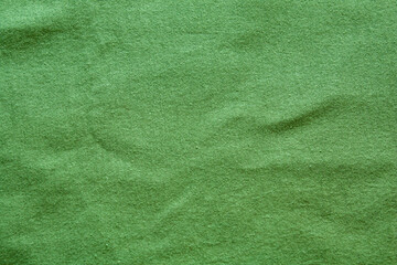 green t-shirt fabric top view