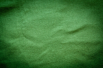 green t-shirt fabric top view