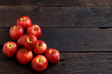 fresh red  apples on the wooden floor