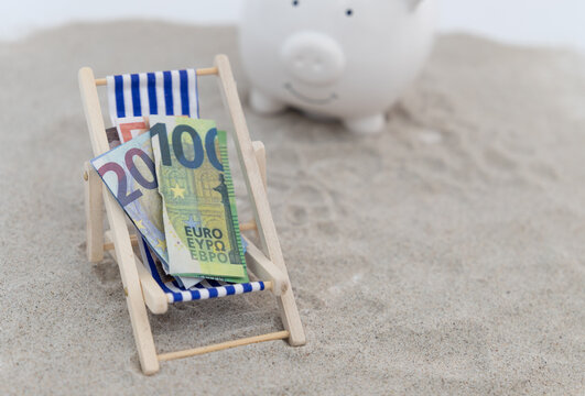 desk chair and piggy bank with banknotes as a concept for inflation and price increases for holiday or save money for holiday