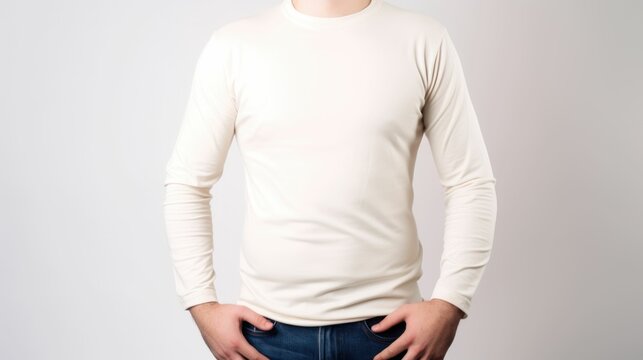 White man model wearing a plain white long sleeve t-shirt, isolated on a blank background. Mock-up, torso only. Generative AI illustration.
