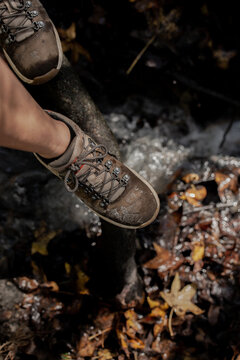 Close up top down of shoes boots legs woman girl walking hiking in the woods