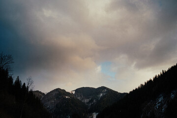 time clouds over the mountains