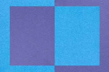 Texture of blue and violet paper background with geometric shape and pattern, macro. Craft turquoise cardboard