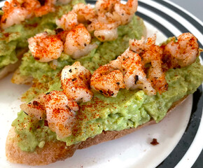 grilled shrimp with smashed avocado on toast