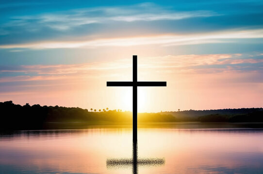 Sunrise over a cross on water