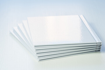 pack of printed products, close-up photo books, blank covers