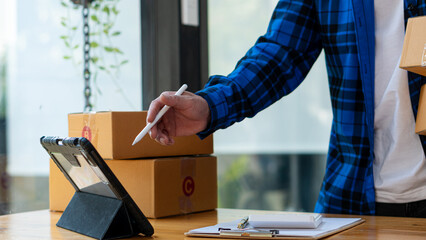 Small business entrepreneurs, take note of shipping addresses from customers, manage orders in...