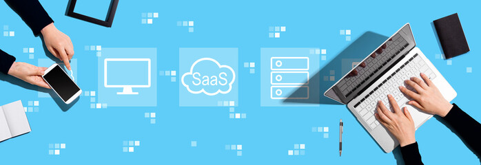 SaaS - software as a service concept with two people working together