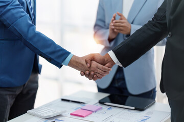 Business partnership meeting concept. Image business people handshake. Successful businessmen handshaking after good deal. Group support concept