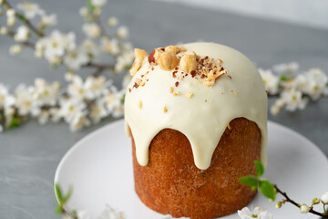 Traditional Easter cake with nuts on gray background