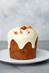 Traditional Easter cake with nuts on gray background