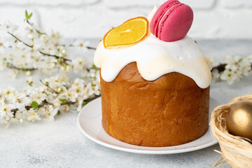 Beautiful Easter cake decorated with macarons cookie and dry orange piece