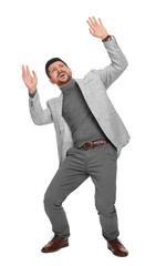 Emotional bearded businessman in suit evading something on white background