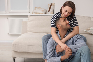 Obraz premium Dating agency. Happy couple enjoying time together at home, space for text