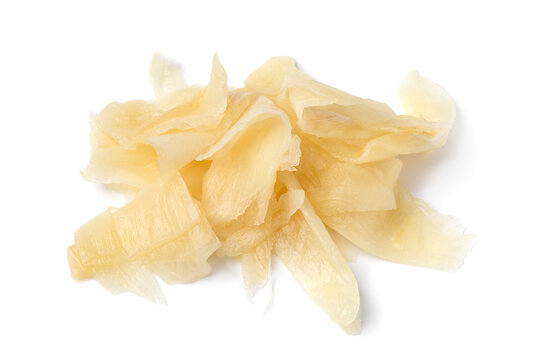 Heap of pickled white Japanese sushi ginger close up isolated on white background