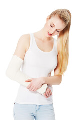 Woman with arm injury, cast and broken with accident or medical emergency isolated on transparent...