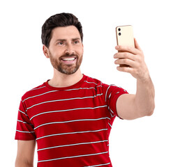 Smiling man taking selfie with smartphone on white background