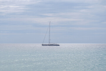 Naklejka premium Beautiful landscape with sailboat in the ocean on the Canary Island Fuerteventura, Spain.