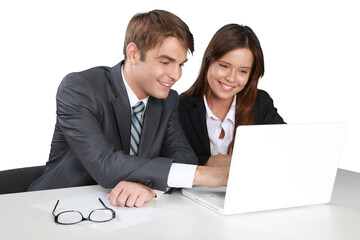 Young business man and woman in suit using laptop isolated on white background
