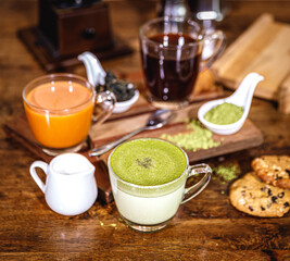 tea and milk in glass. Close up.