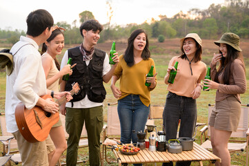 Group of young  Asian people are enjoy camping in natural campsite