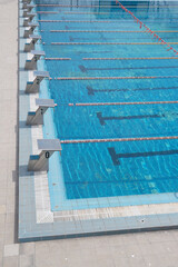 outdoor sports swimming pool with lanes and bollards for jumping