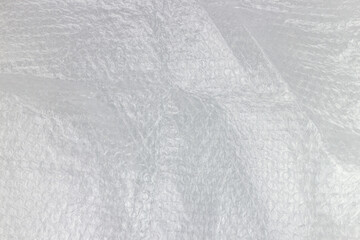 White polyethylene texture. Polyethylene background. Polyethylene texture