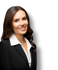 Portrait of happy smiling young businesswoman in black confident suit, isolated against white background. Business woman at studio.