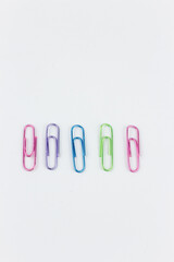 colorful paper clips isolated on white background,
