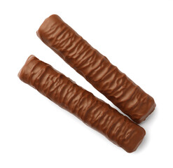 Sweet tasty chocolate bars on white background, top view