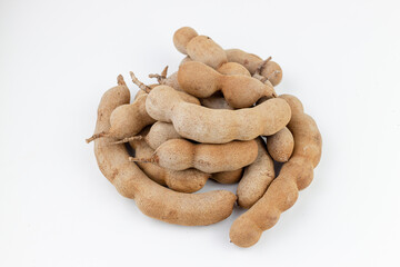 Tamarind isolated on white background. Sweet tamarind.