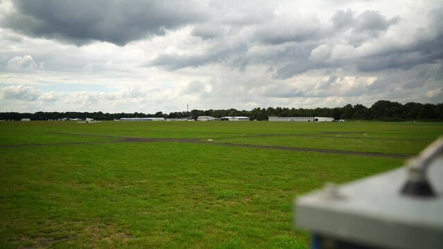 shot over a small airfield with a meadow