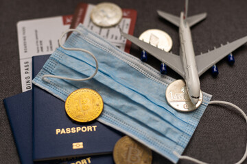 Bitcoin with aeroplane, passport. Cryptocurrency Business concept.